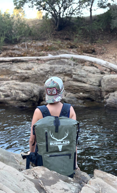 Bushlads pack at a swimming hole