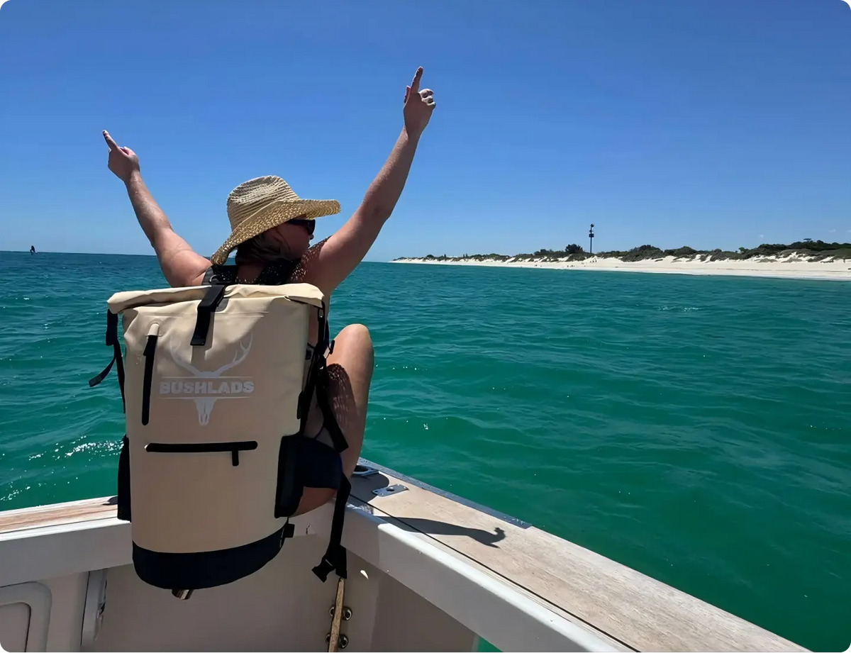 Man on a boat carrying the Bushlads 35L backpack