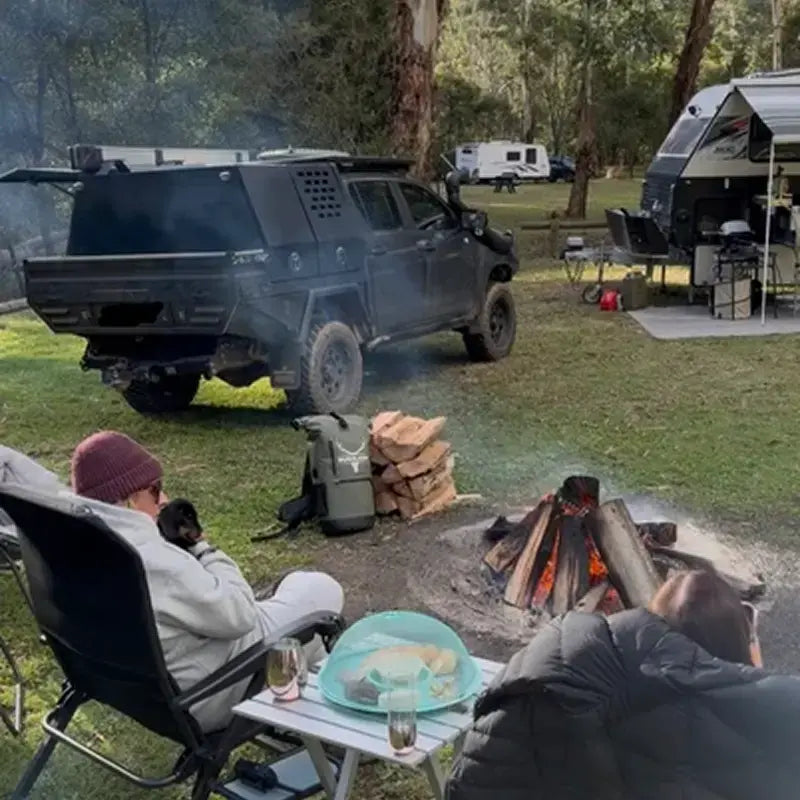 Camp set up beside a 4WD with the Bushlads pack and gear laid out