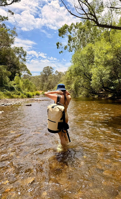 Bushlads pack in a creek